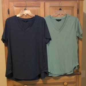 Two women's tunic shirts